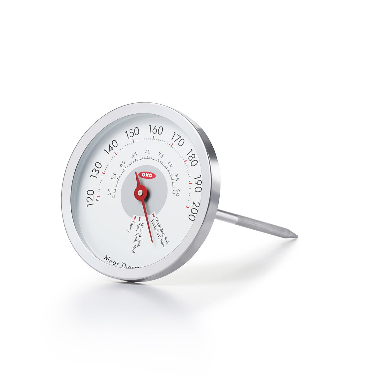 OXO Good Grips Chef's Precision analog thermometer in meat for steady, accurate cooking readings.