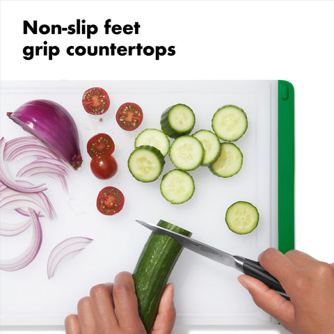 OXO Good Grips board with non-slip feet stays secure while chopping.