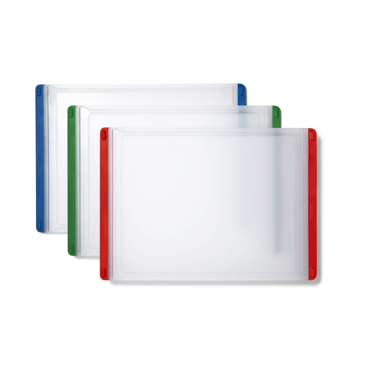 OXO Good Grips red cutting board for meat prep with color-coding to prevent cross-contamination.