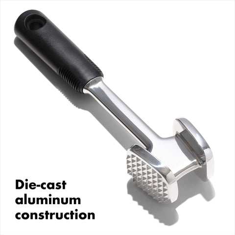 OXO Good Grips die cast meat tenderizer flat side for quick, even flattening.