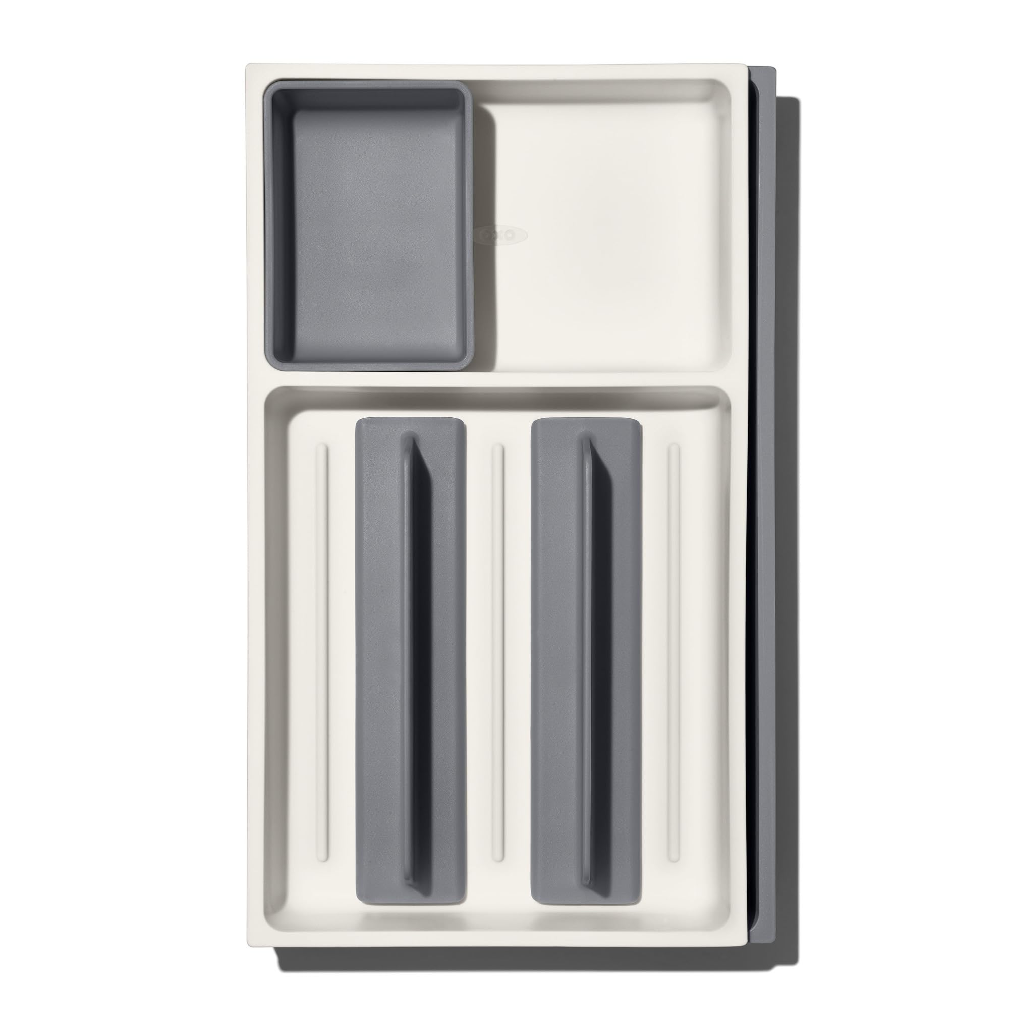OXO Good Grips organizer includes a storage cup for small gadgets.