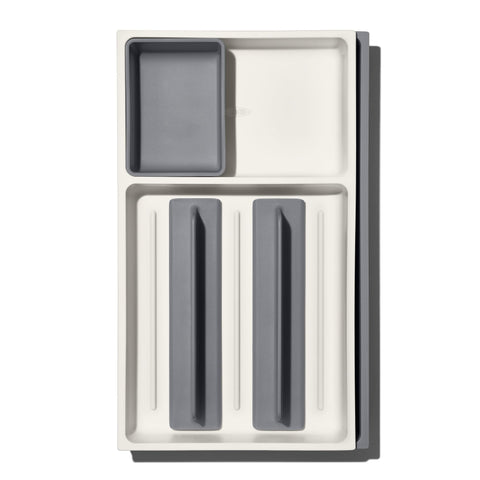 OXO Good Grips organizer includes a storage cup for small gadgets.