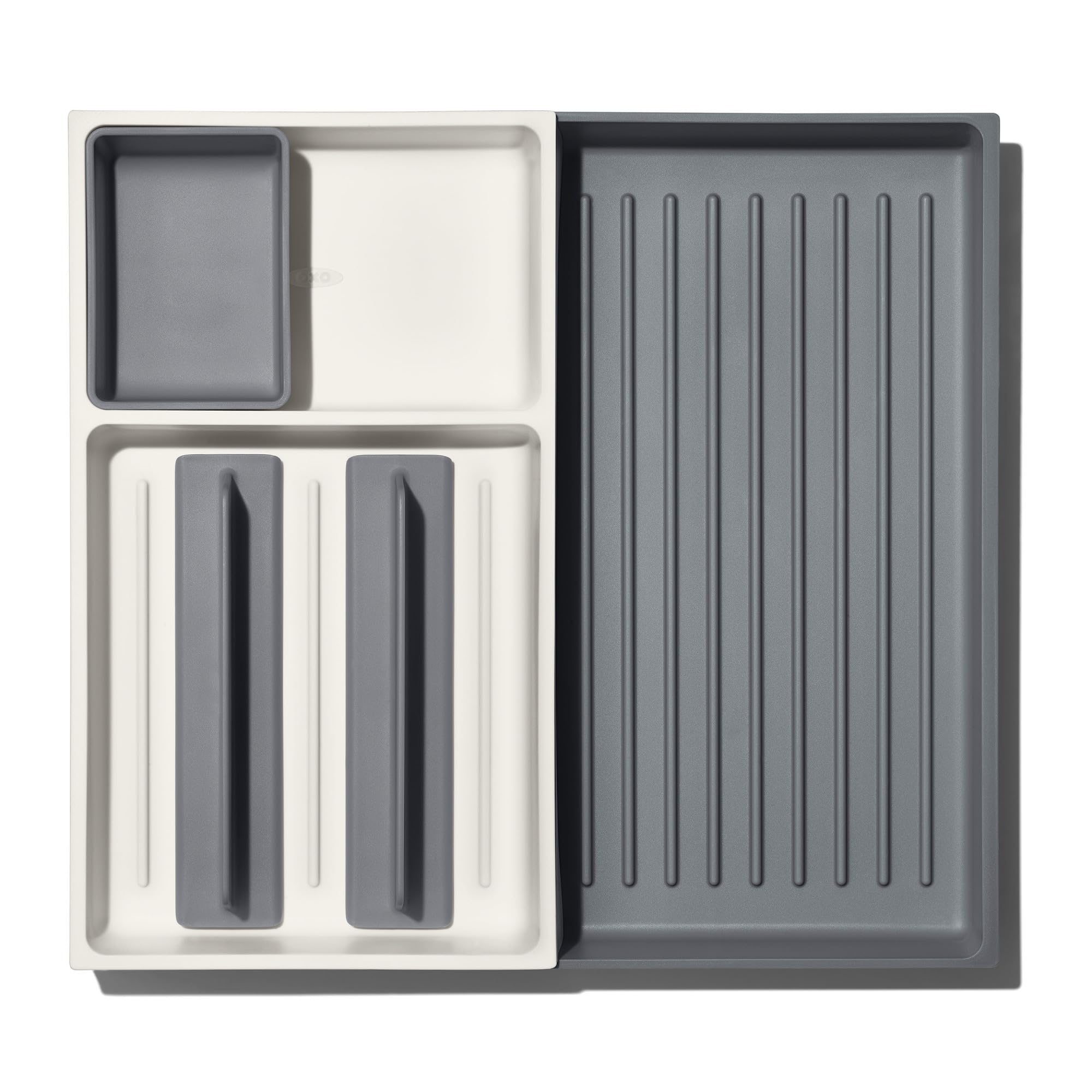 OXO Good Grips large expandable drawer keeps long tools neatly in reach.