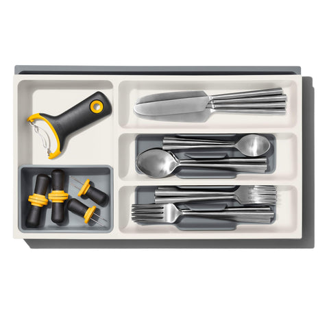 OXO Good Grips organizer includes a removable cup for wine stoppers and small gadgets