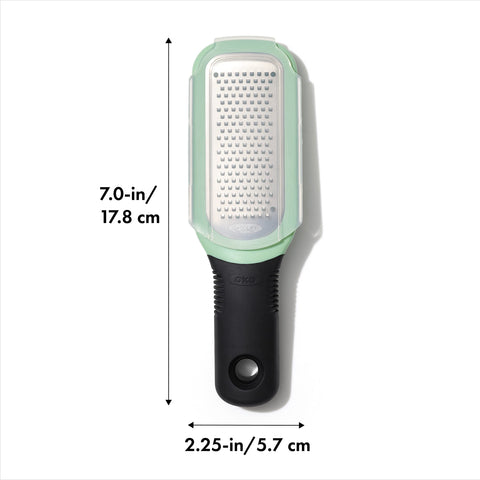 OXO Good Grips Etched Ginger & Garlic Grater teeth shredding garlic for quick prep