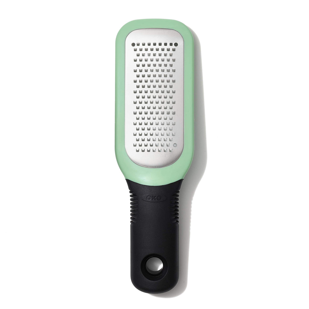 OXO Good Grips Etched Ginger & Garlic Grater grating ginger paste smoothly, ergonomic handle