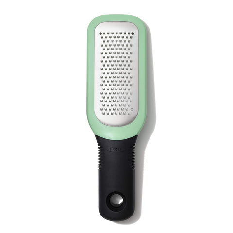 OXO Good Grips Etched Ginger & Garlic Grater grating ginger paste smoothly, ergonomic handle