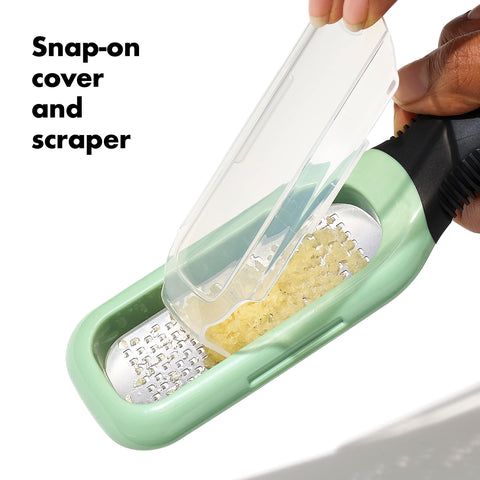 OXO Good Grips soft non-slip handle provides steady control while grating fibrous roots
