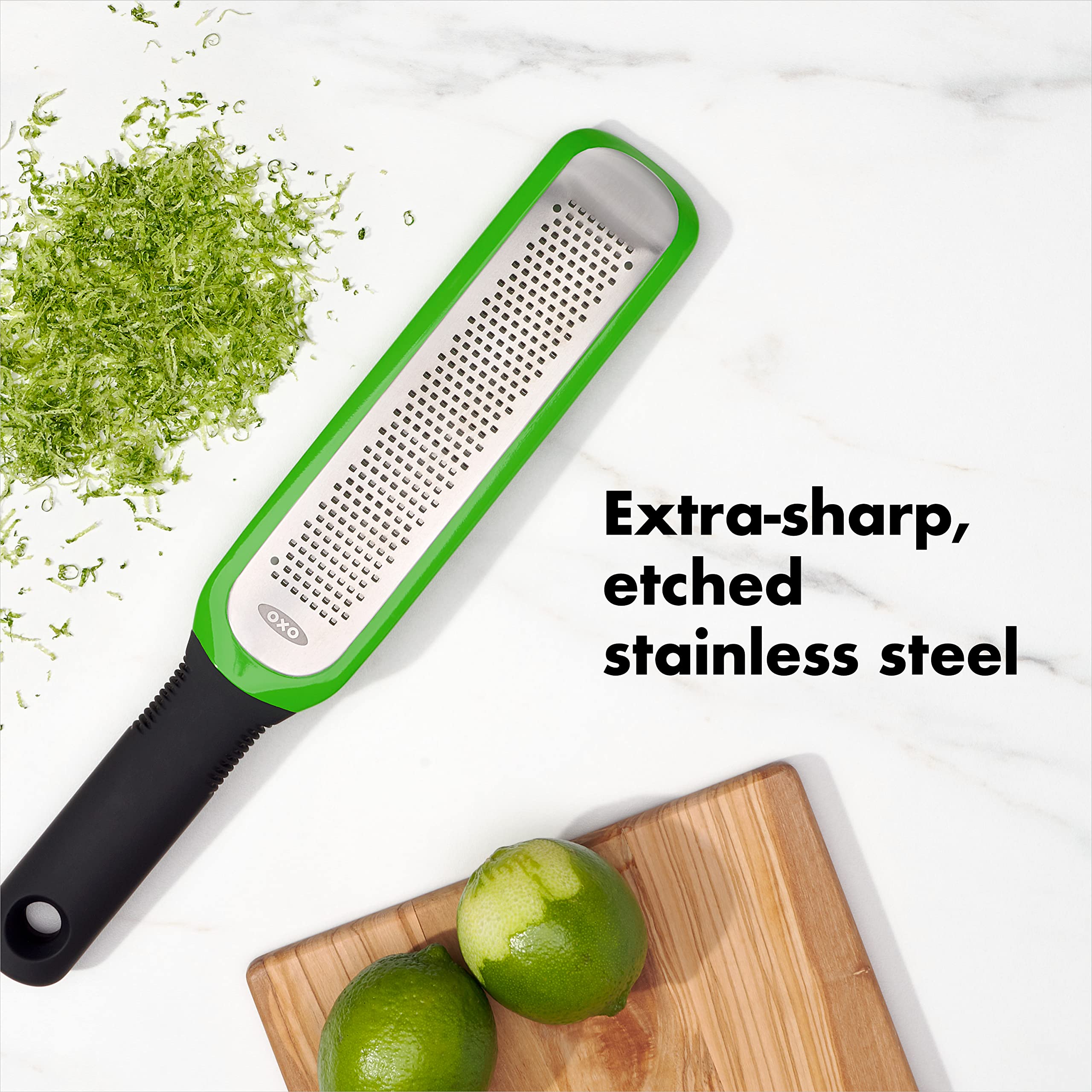 OXO Good Grips etched zester used on citrus to release fresh zest quickly.