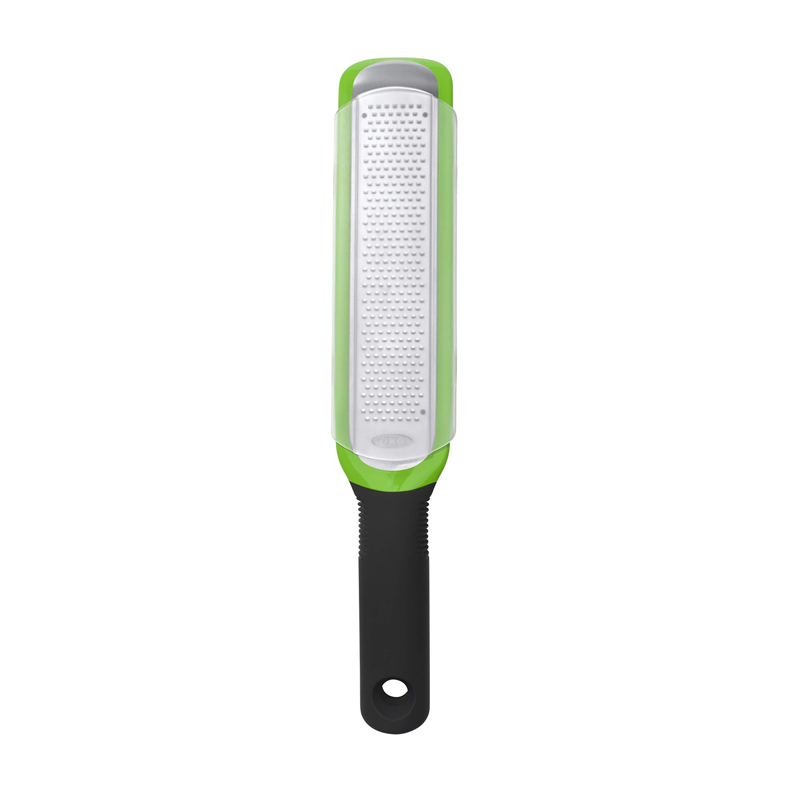 OXO Good Grips etched zester handle close-up highlighting comfortable grip for zesting.