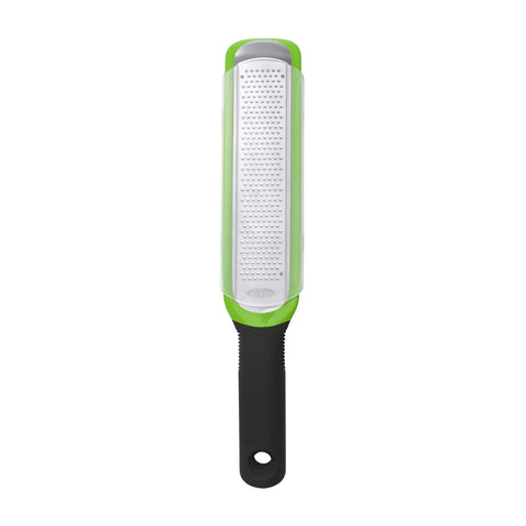 OXO Good Grips etched zester handle close-up highlighting comfortable grip for zesting.