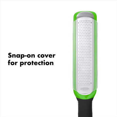 OXO Good Grips etched zester with blade cover for safe, clean storage.