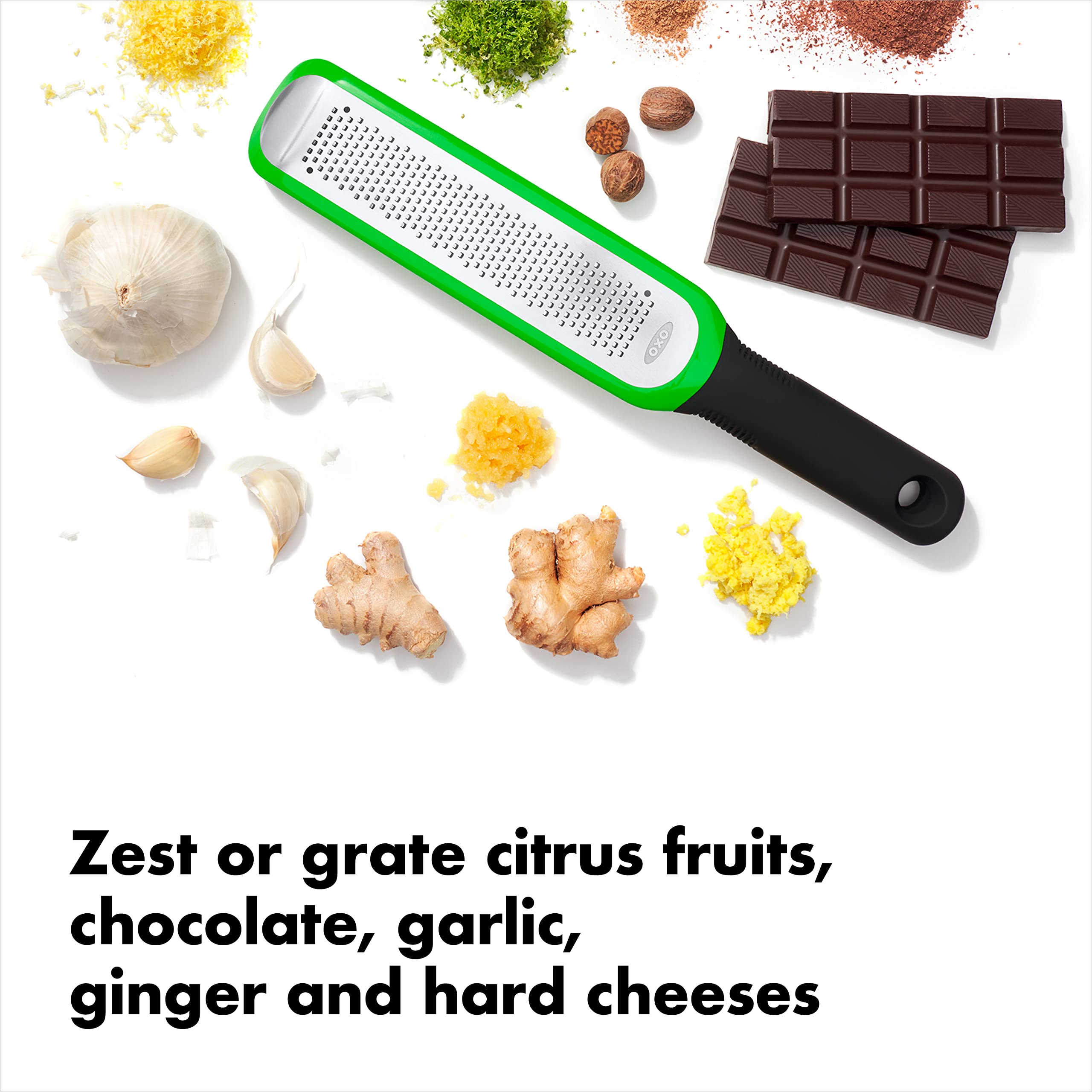 OXO Good Grips etched zester grates hard cheese neatly with a precise surface.