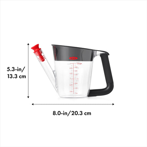OXO Good Grips fat separator strainer catching bits for clear juices