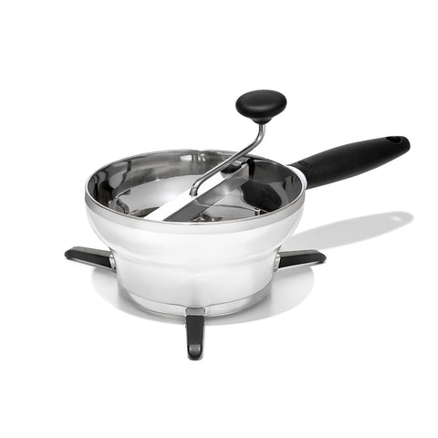 OXO Good Grips Food Mill positioned over a bowl for smooth purees.