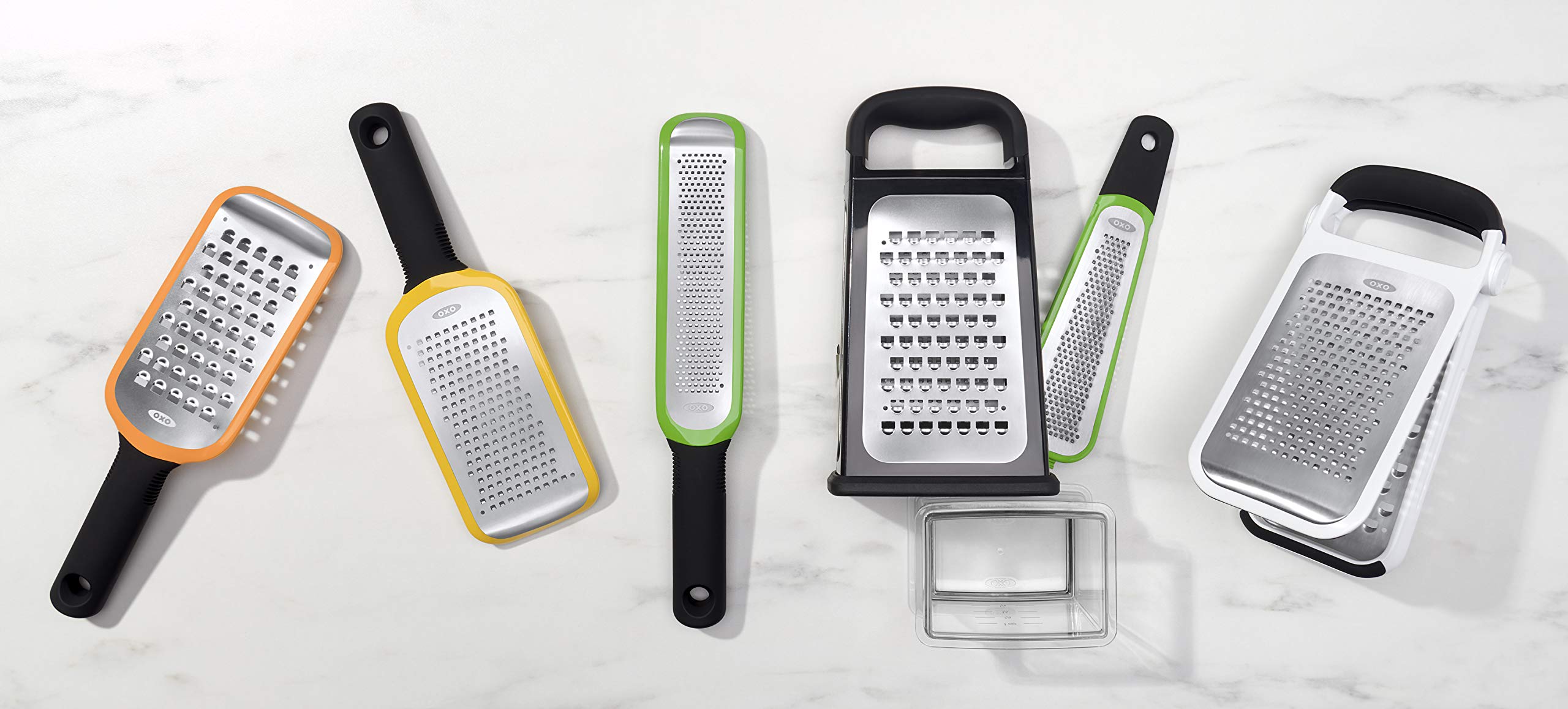 OXO Good Grips grater in use cheese grating for semi-soft varieties