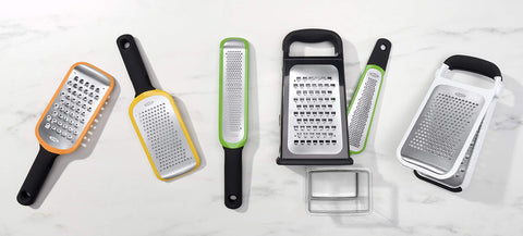 OXO Good Grips grater in use cheese grating for semi-soft varieties