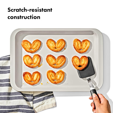 OXO Good Grips heavy-gauge aluminized steel bakeware pan for long-lasting stability.