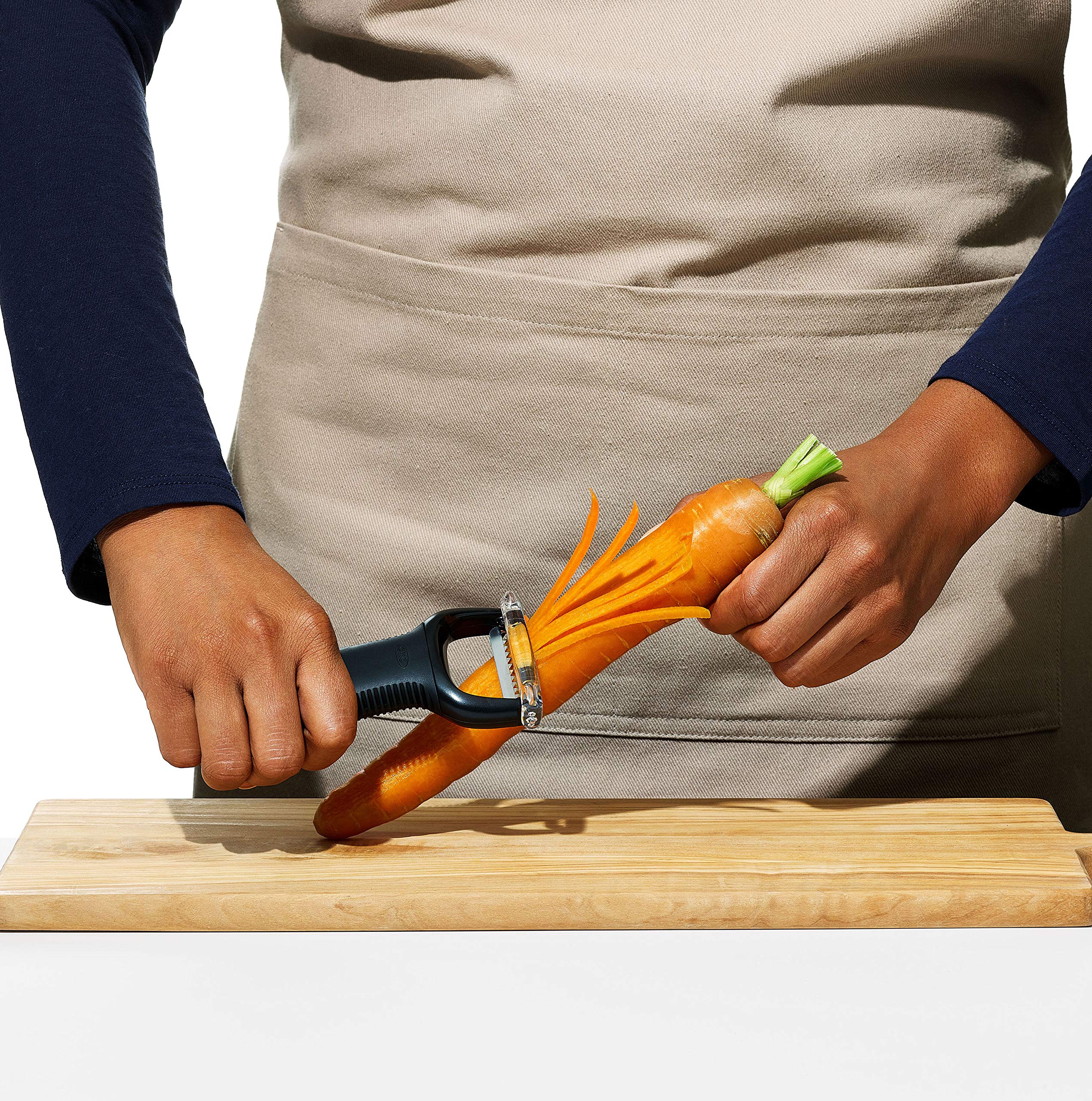 Ready-to-serve plates with julienne garnishes made by OXO peeler