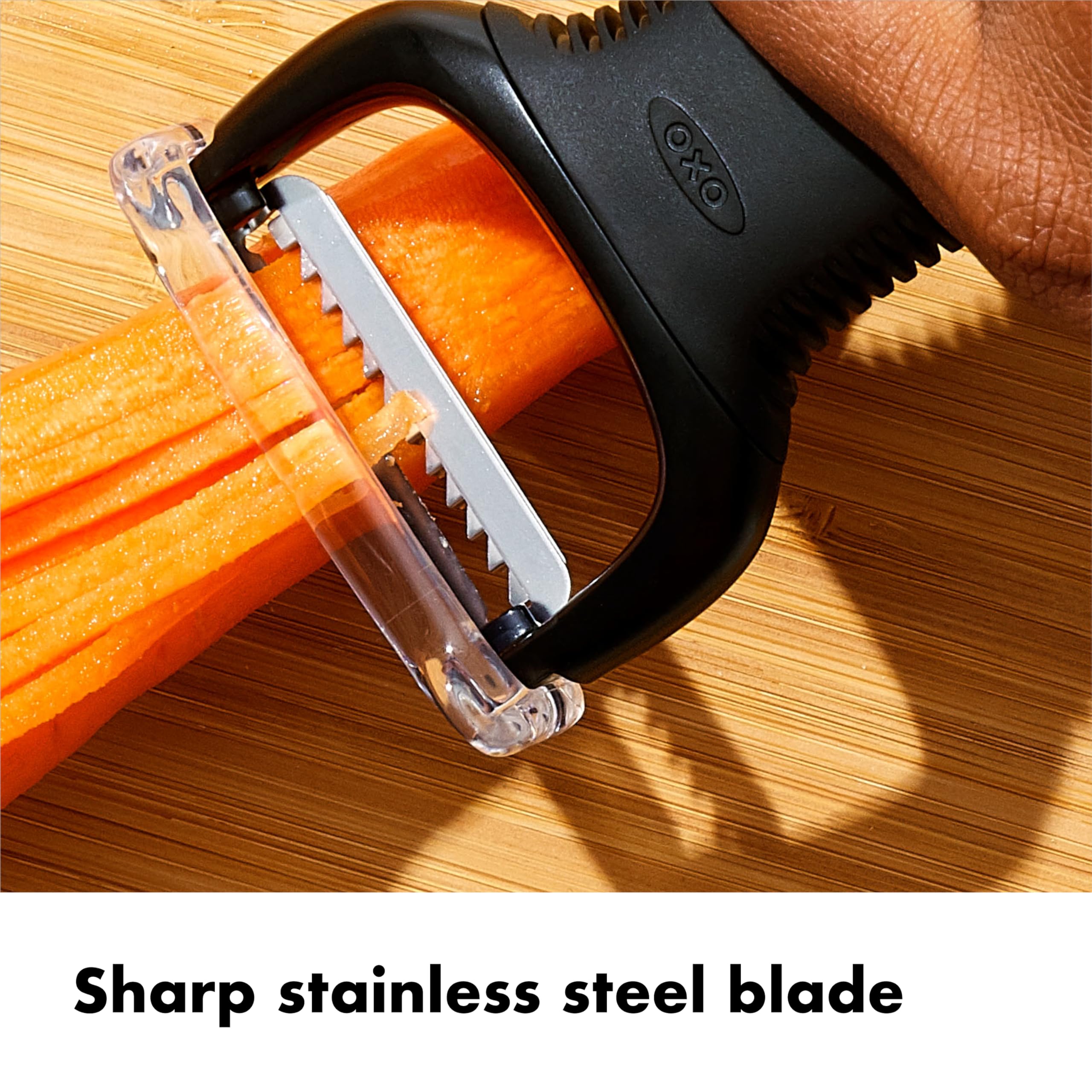 Soft non-slip handle close-up on the OXO julienne peeler for comfortable grip