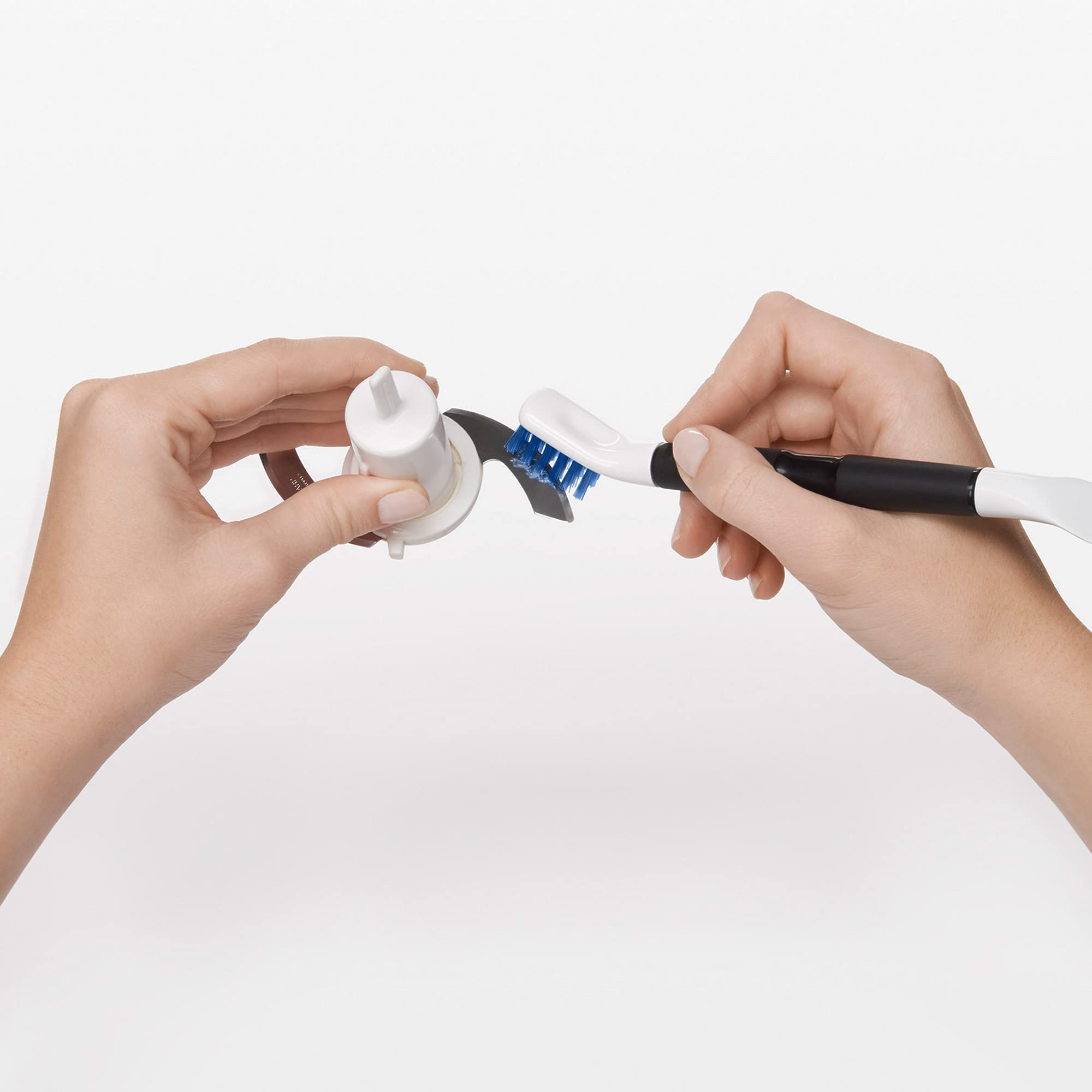 OXO Good Grips angled brush clean fixtures and surfaces with ease