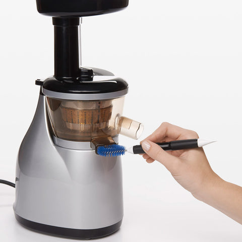 OXO Good Grips angled brush reaches grout lines and fixtures
