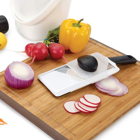 Protective food holder on OXO mandoline keeps fingers safe