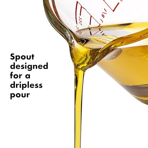 OXO Good Grips silicone-handle measuring cup stays secure when hands are wet.