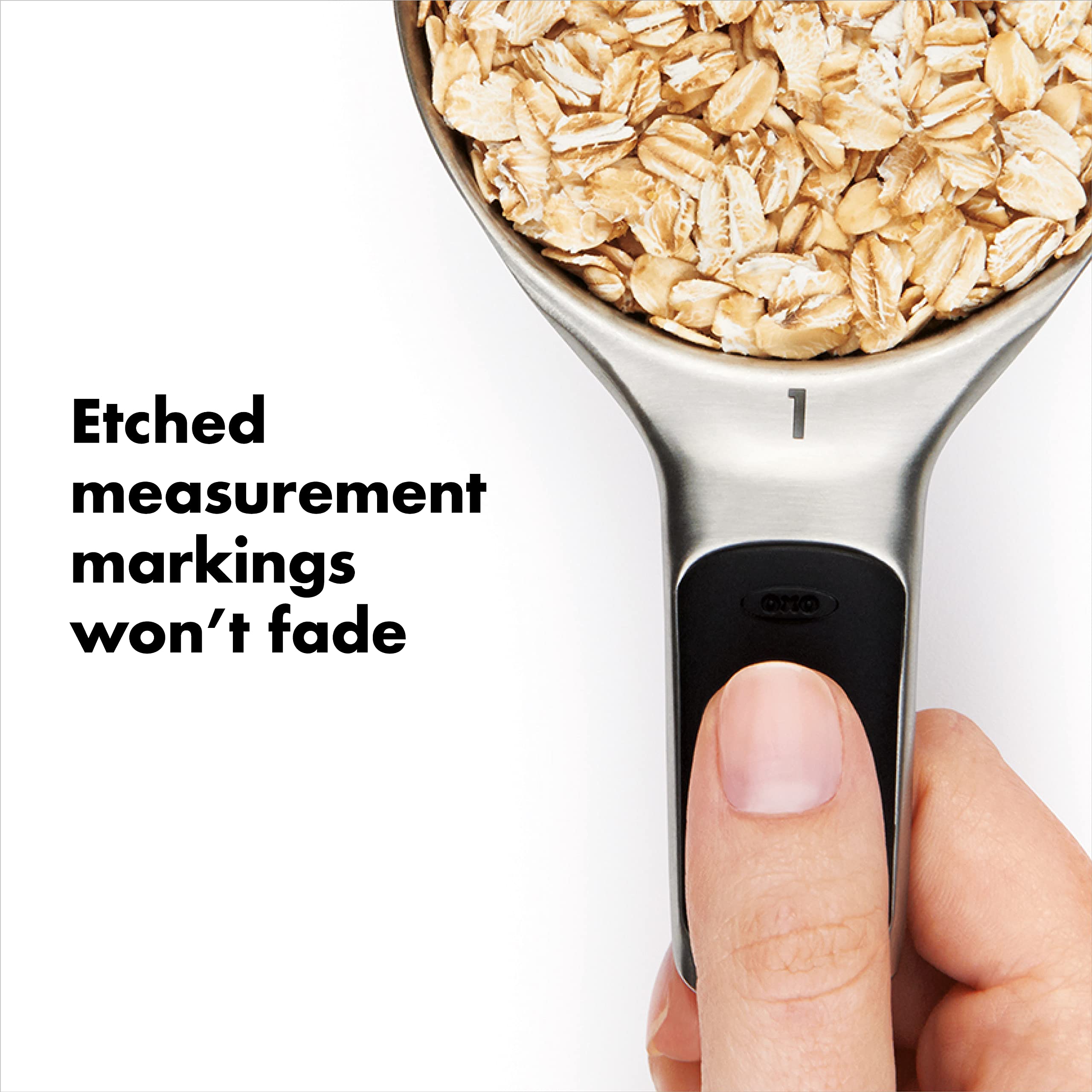 OXO Good Grips 1/3-cup stainless steel measuring cup with clear engravings.