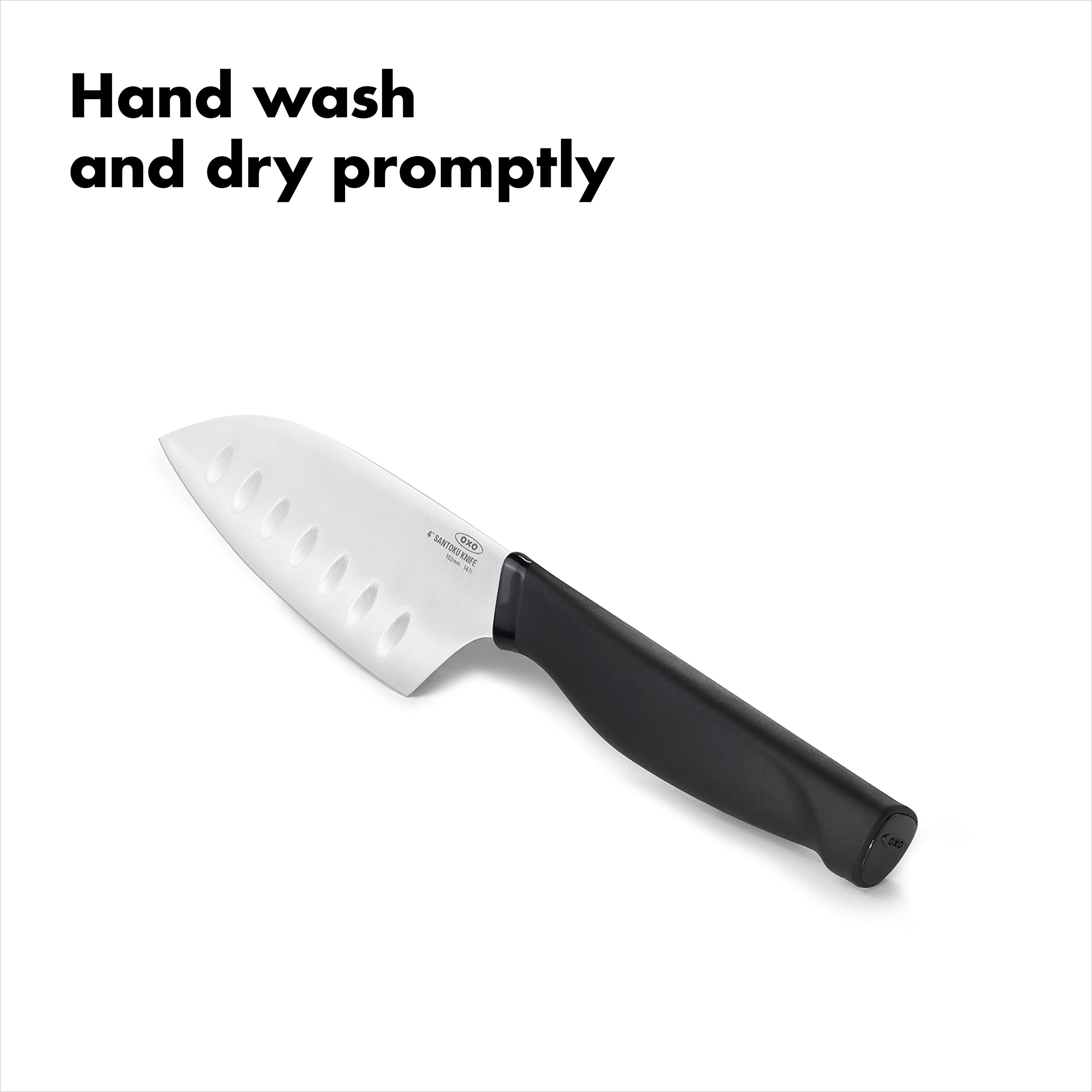 Person uses compact knife for herbs on a cutting board.