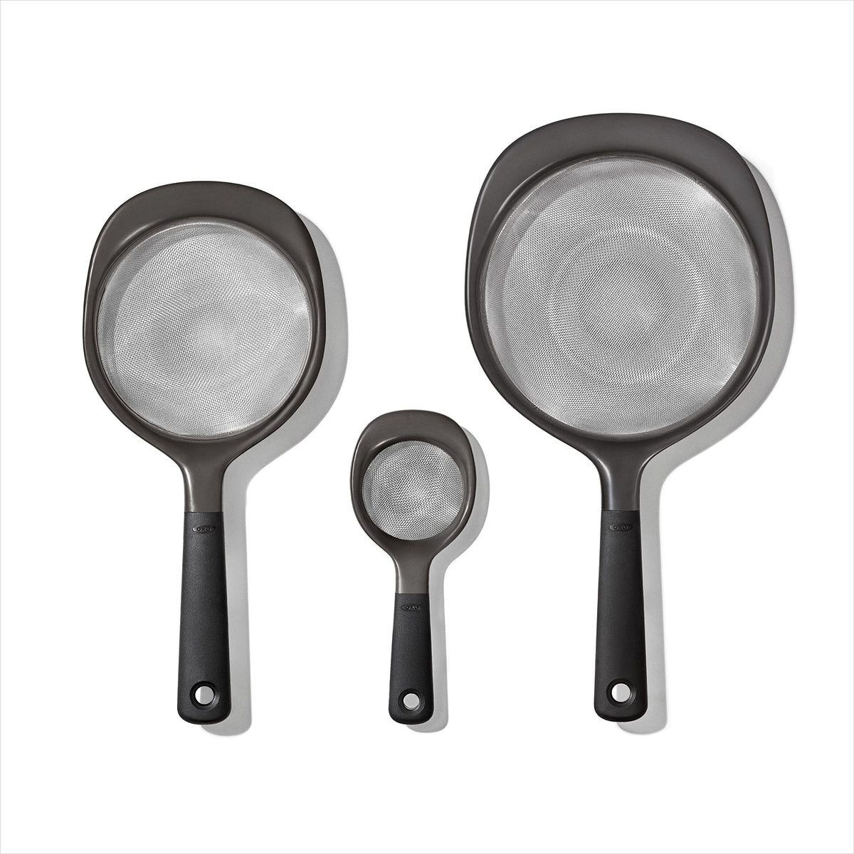 OXO Good Grips mini strainer shown for citrus juice and seeds, compact and precise.