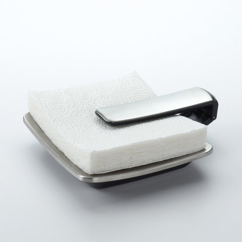 OXO Good Grips napkin holder arm weighted to hold napkins securely during meals