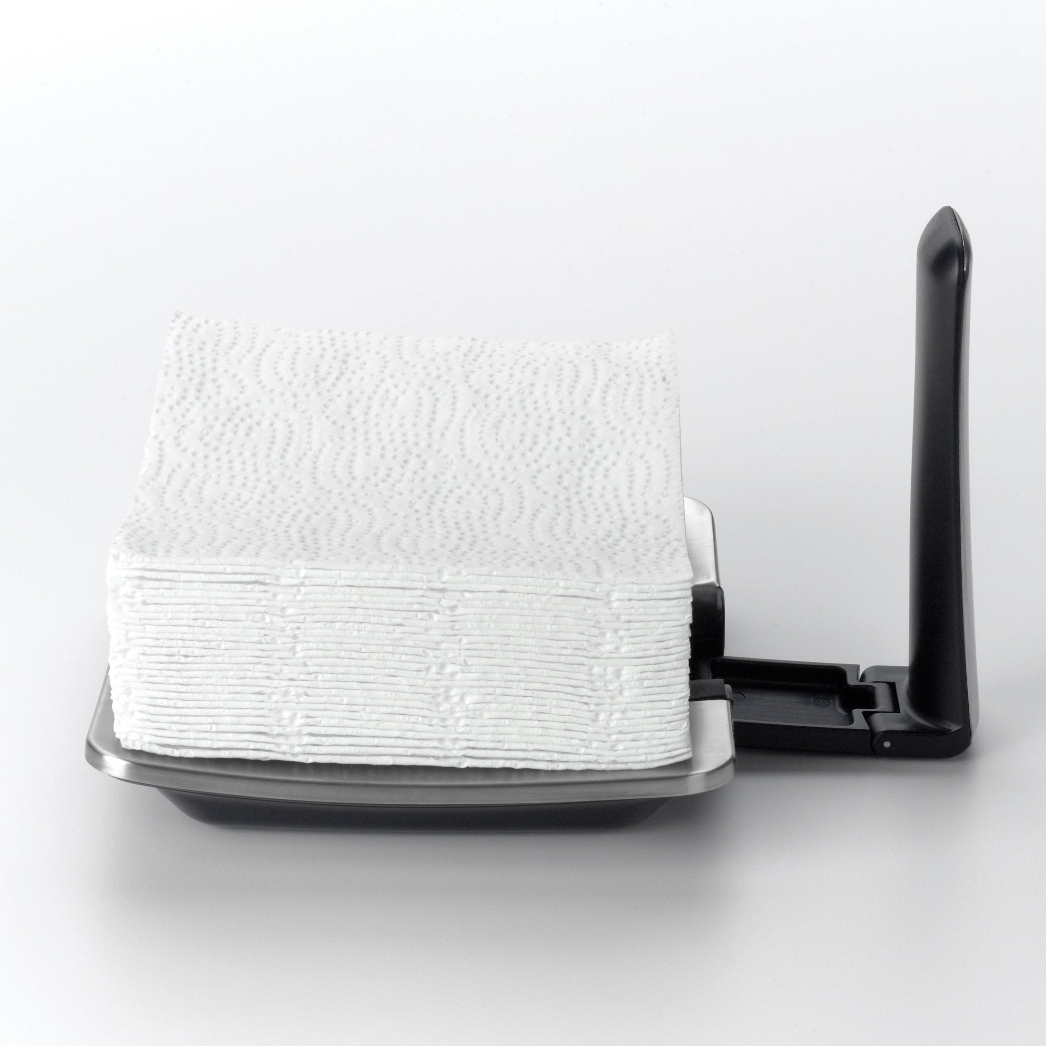 OXO Good Grips napkin holder features sturdy stainless steel weighted body