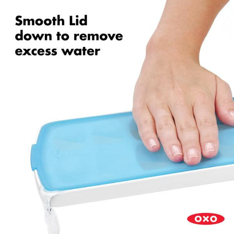 OXO Good Grips No-Spill Tray stored at an angle to demonstrate leak-proof storage.