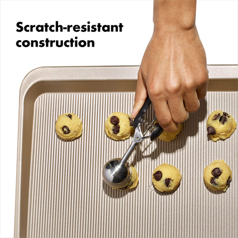OXO Good Grips rolled-edge sheet reinforces structure for safety