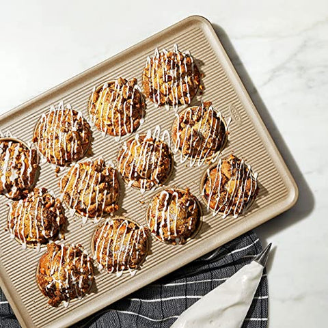 OXO Good Grips Non-Stick Pro muffin pan dishwasher safe for easy cleanup.
