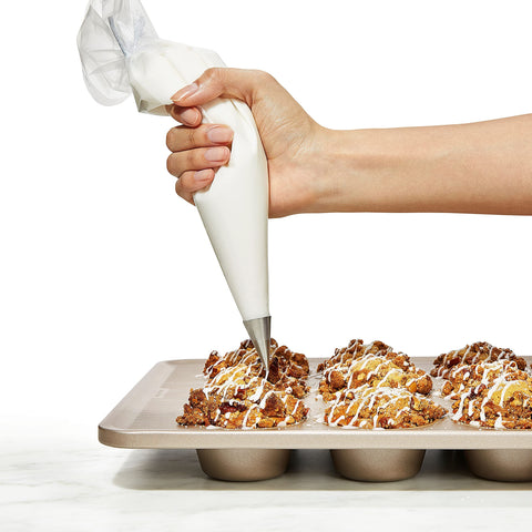 OXO Good Grips Non-Stick Pro muffin pan muffins cupcakes ready-to-release after bake.