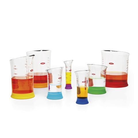 OXO Good Grips one-oz beaker great for tiny quantities.