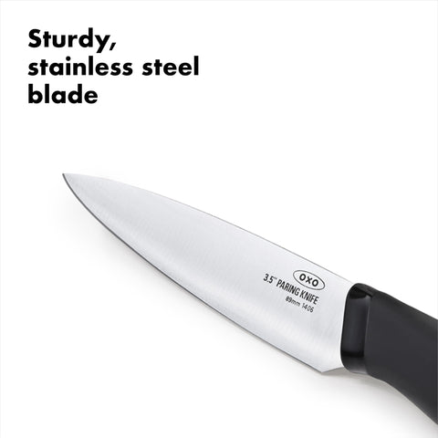 OXO Good Grips paring knife in wet use showing slip-proof control.