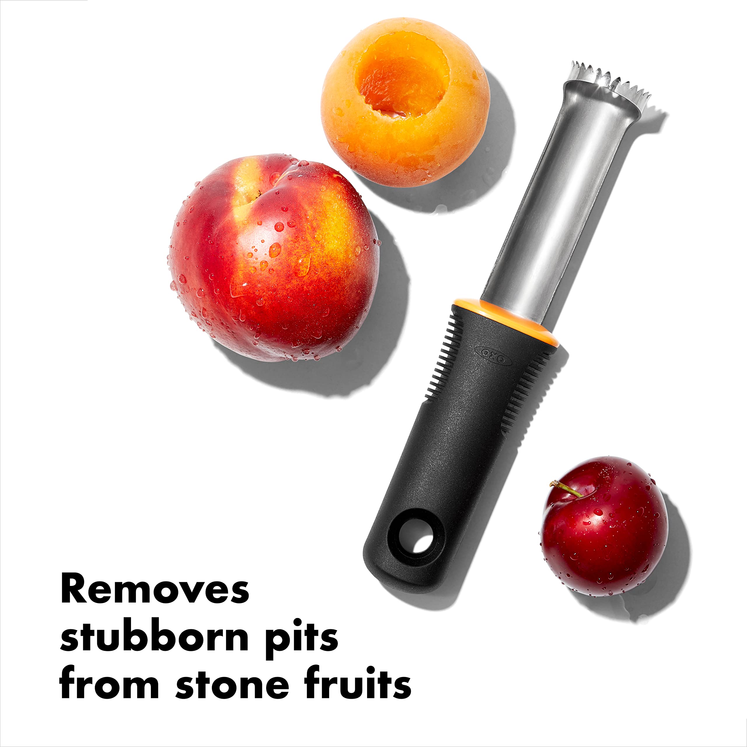 Flexible head of OXO Peach Pitter adapting to pit size during use