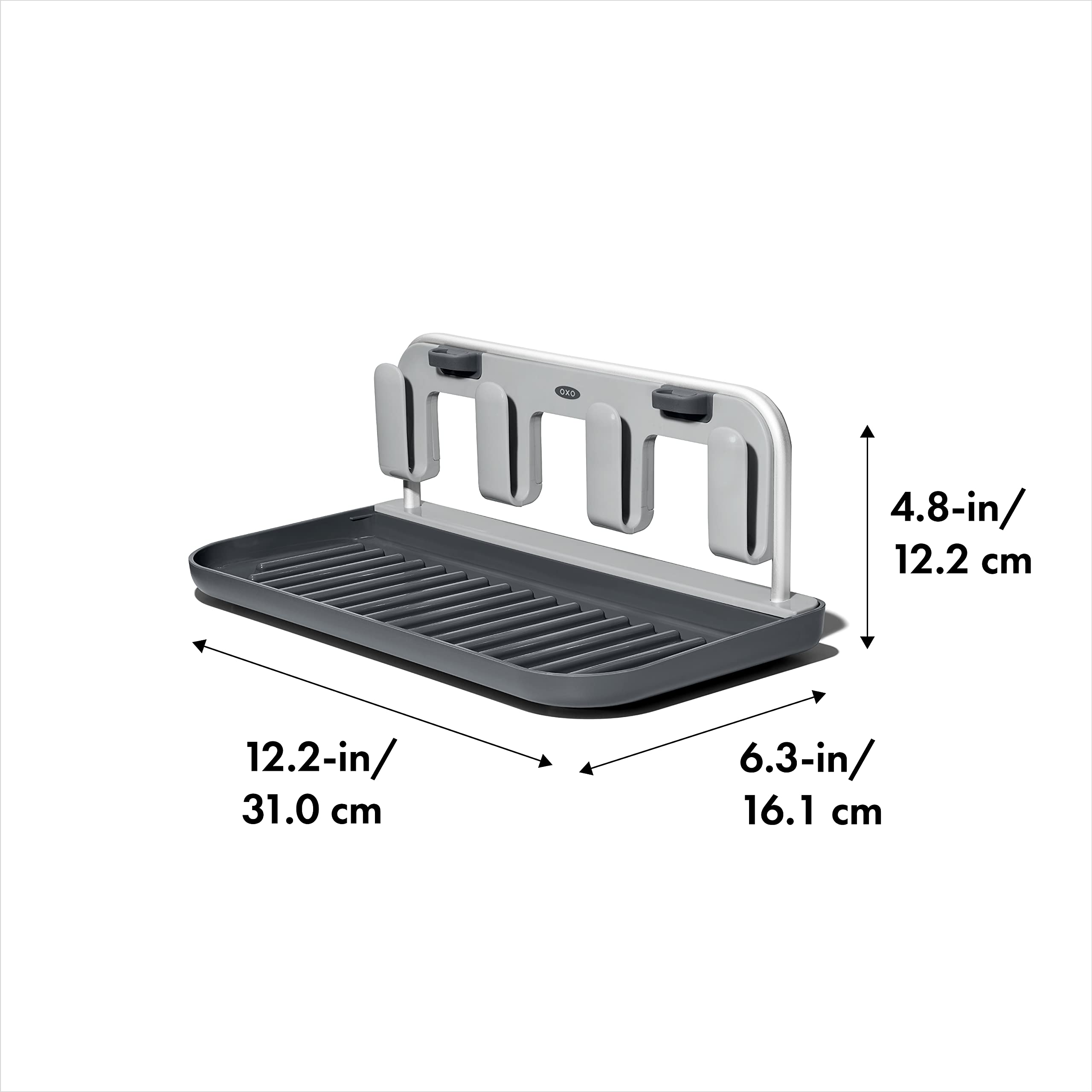 OXO Good Grips raised edges preventing lids and caps from rolling away