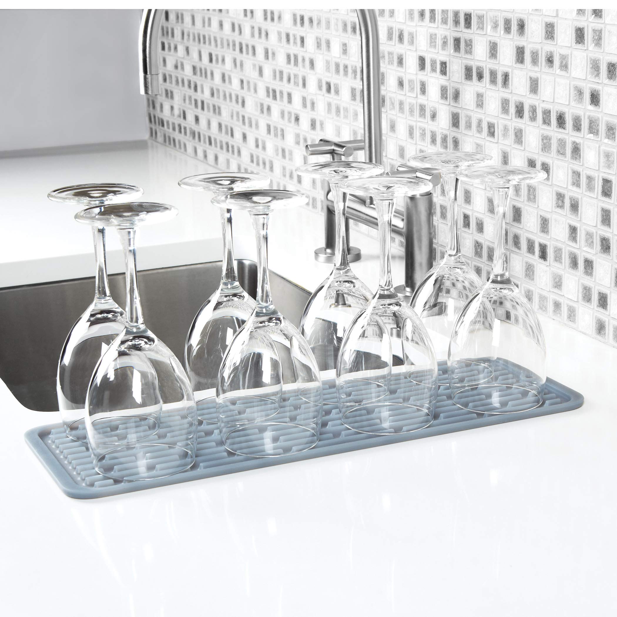 OXO Good Grips rib-design drying mat enhances drainage and protects delicate glasses