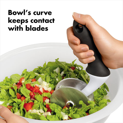 OXO Good Grips bowl rim used as grip while chopping