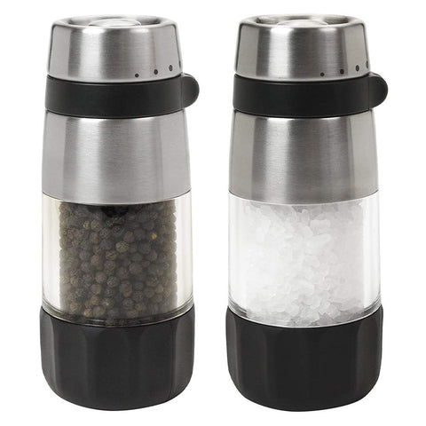 OXO Good Grips salt and pepper grinders, top view showing sleek stainless steel finish and clear bodies.
