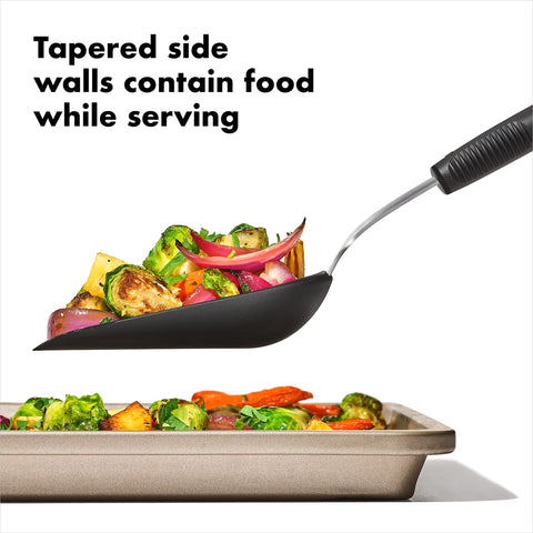 OXO Good Grips Sheet Pan Scoop features a durable edge for lifting and scraping pans.
