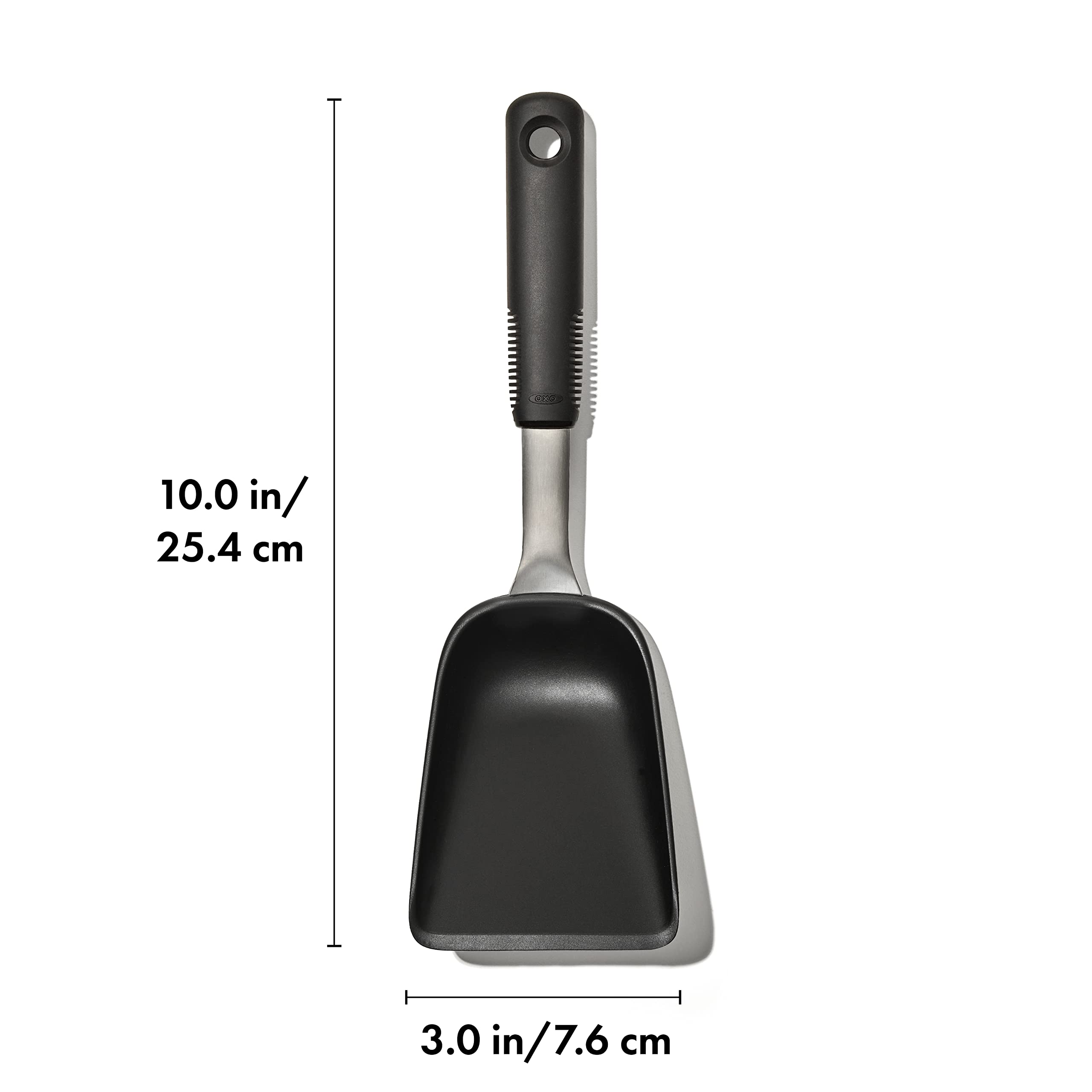 OXO Good Grips Sheet Pan Scoop shows tapered walls to keep food in place during serving.