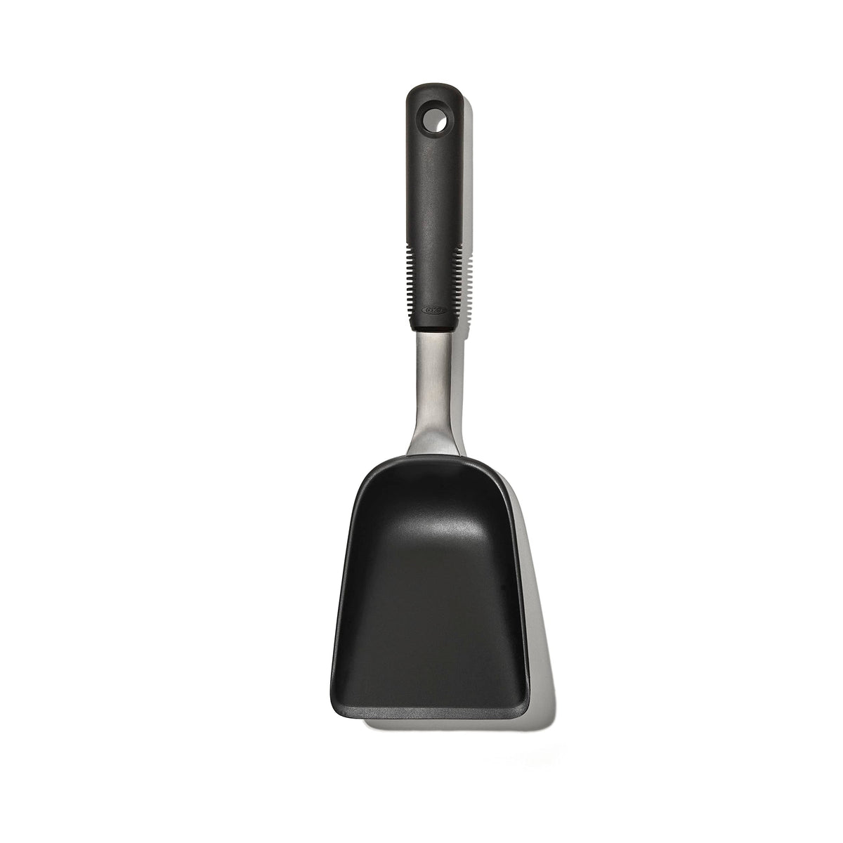 OXO Good Grips Sheet Pan Scoop with a wide head for quick, mess-free veggie transfers.