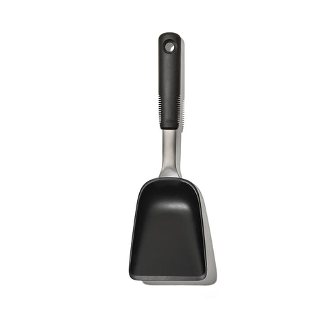 OXO Good Grips Sheet Pan Scoop with a wide head for quick, mess-free veggie transfers.