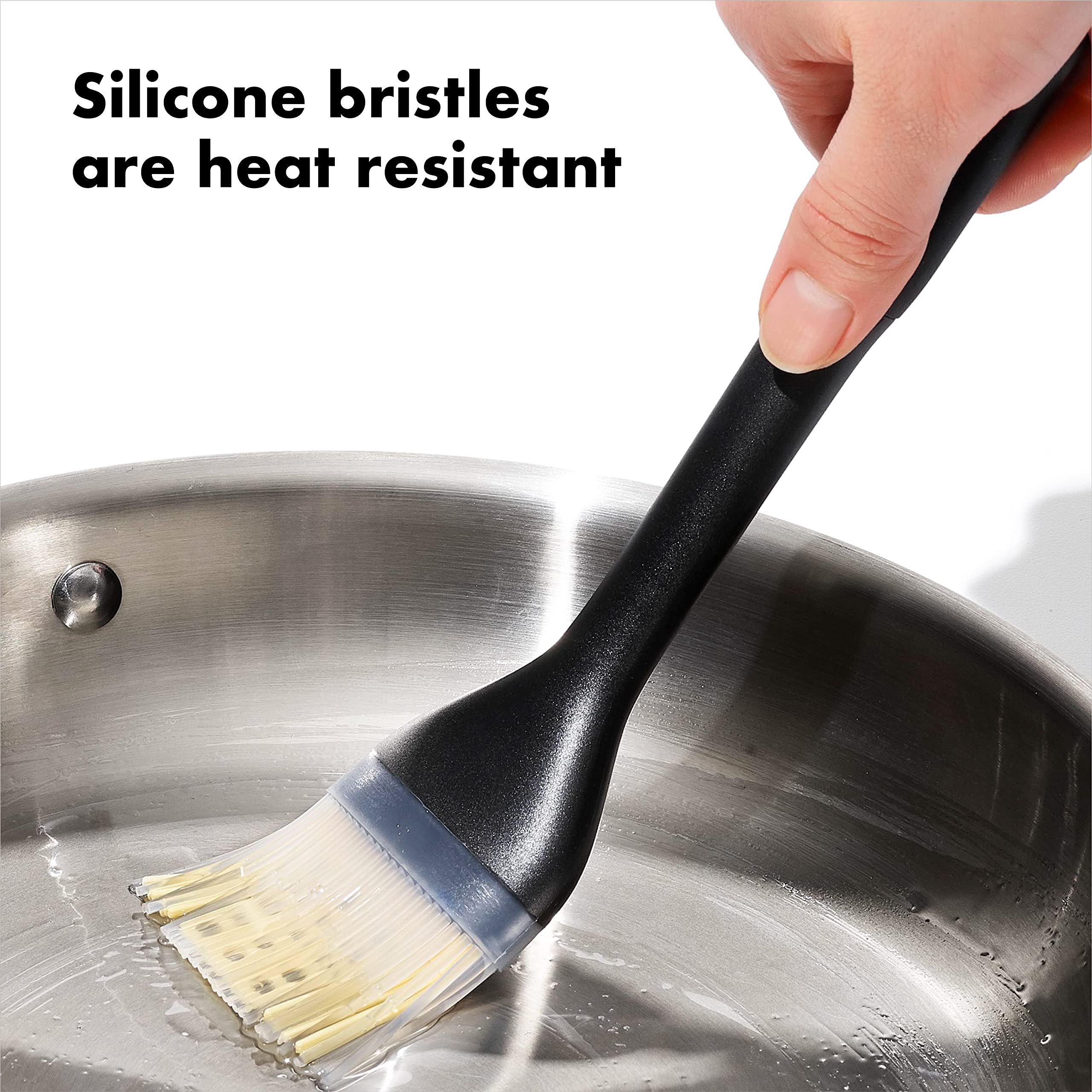 OXO Good Grips Silicone Basting Brush angled head keeps bristles off counters for mess-free prep.