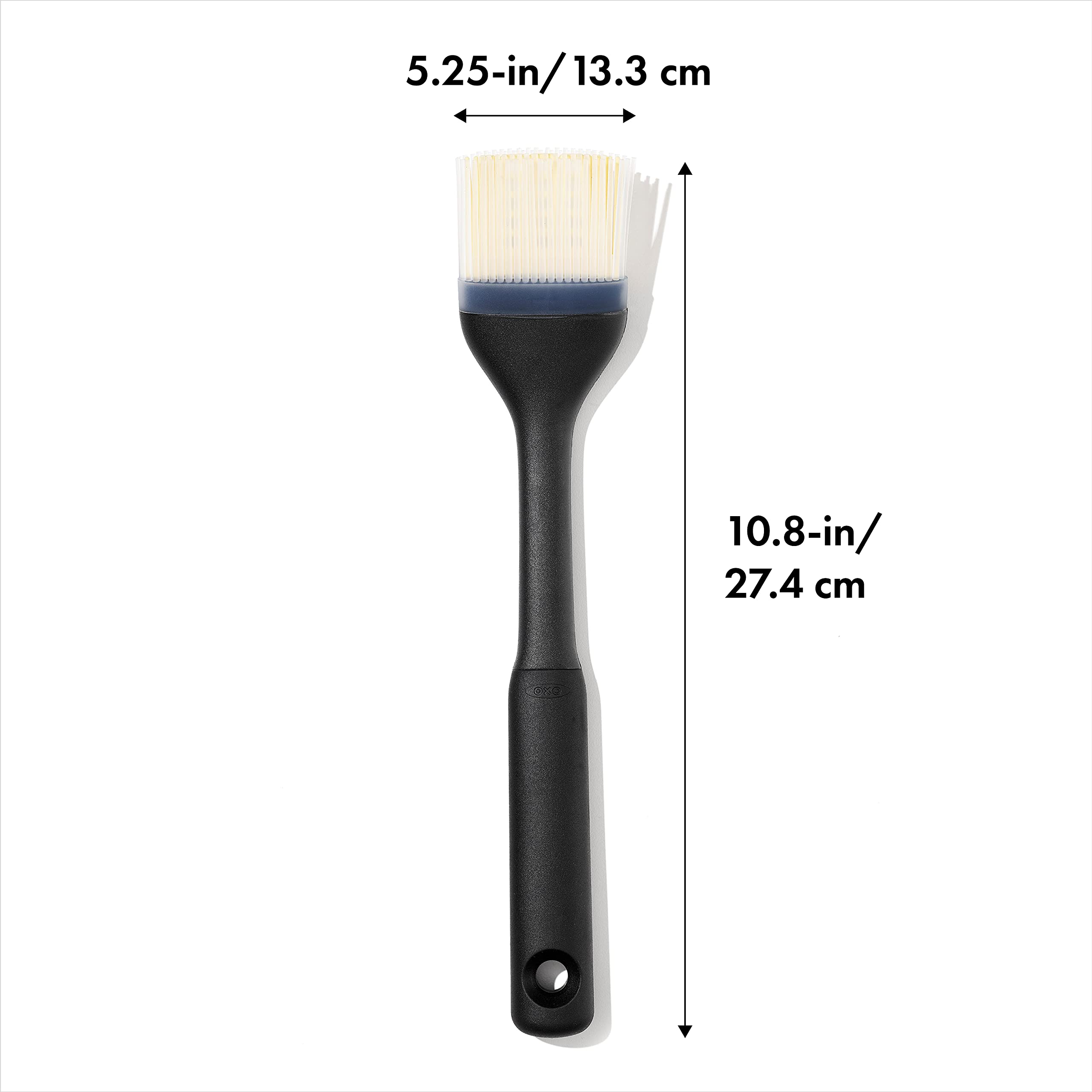 OXO Good Grips Silicone Basting Brush holds liquids for even basting.